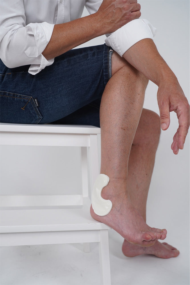 manage drainage from ankle ulcer with aerobolster foam medium crescent with pre filled air bolster